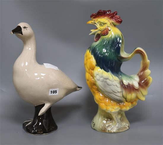 A French novelty cockerel jug and a glazed duck height 39cm